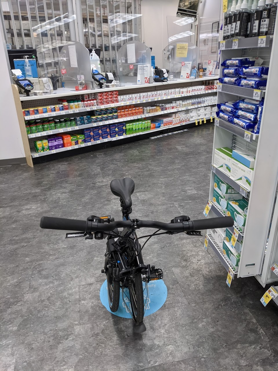 Brompton, folded in "shopping cart" mode inside a CVS