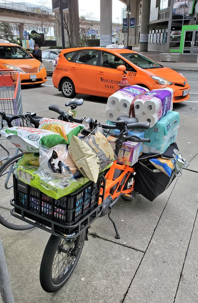 Tern GSD with a huge amount of groceries on the front and back