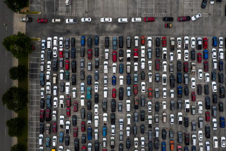 overhead shot of cars in line at a San Antonio food bank in April 2020, from Reuters