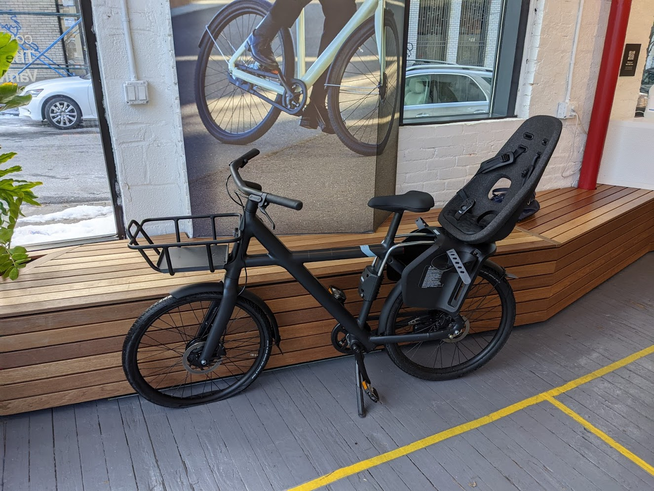 VanMoof X3 with a child seat on the back