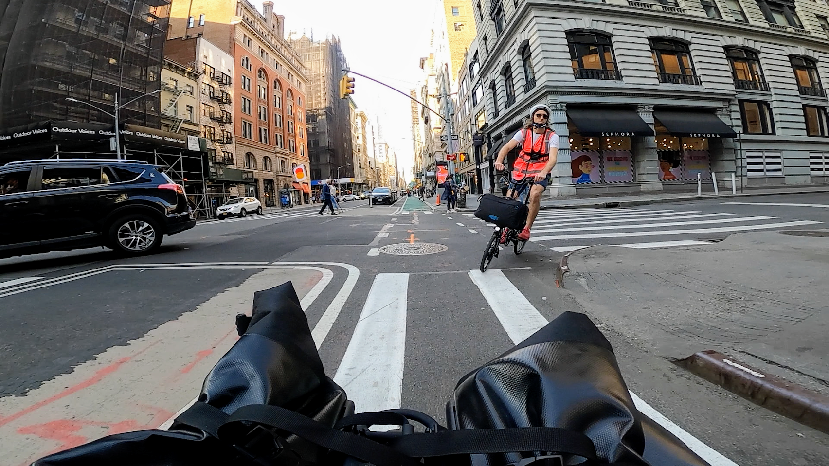 rear GoPro view of me riding electric Brompton on 5th Ave in NYC